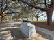Scenic park view with large trees and historical artillery on display at 133 Wentworth St, Charleston, SC 29401