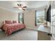 Bright bedroom with two large windows, neutral paint, and carpeted floors at 1502 Checker Ct, Mount Pleasant, SC 29466