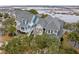 Aerial view showcasing waterfront homes with picturesque views and beautiful architectural design at 1607 Folly Creek Way Way # C-5, Charleston, SC 29412