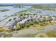 Breathtaking aerial view of waterfront homes offering private docks and access to the waterway for a luxurious lifestyle at 1607 Folly Creek Way Way # C-5, Charleston, SC 29412