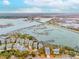 Aerial view of coastal community near ocean inlet and bridges in South Carolina at 1607 Folly Creek Way Way # C-5, Charleston, SC 29412