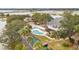 Stunning home boasts an inviting pool and serene creek access, nestled amidst lush greenery and scenic views at 1607 Folly Creek Way Way # C-5, Charleston, SC 29412