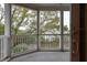 Enclosed balcony with serene views of the surrounding landscape at 1607 Folly Creek Way Way # C-5, Charleston, SC 29412