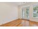 The bedroom offers a private balcony with double doors and access to outdoor views at 1607 Folly Creek Way Way # C-5, Charleston, SC 29412