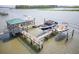 Private dock featuring multiple boat lifts, a covered gazebo, and ample space for boating and waterfront enjoyment at 1607 Folly Creek Way Way # C-5, Charleston, SC 29412