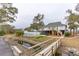 Charming home with a private pool, bridge, and serene outdoor space for relaxation and entertainment at 1607 Folly Creek Way Way # C-5, Charleston, SC 29412