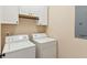 Convenient laundry room equipped with washer and dryer at 1607 Folly Creek Way Way # C-5, Charleston, SC 29412