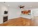 Spacious open-concept layout showcasing the kitchen, living room, and fireplace at 1607 Folly Creek Way Way # C-5, Charleston, SC 29412
