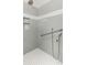 Shower featuring gray tile, a grab bar and mosaic-tiled niches at 1607 Folly Creek Way Way # C-5, Charleston, SC 29412