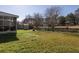 Large grassy backyard with a shed and access to a pond at 1649 Lauda Dr, Mount Pleasant, SC 29464