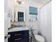 Bathroom features a blue vanity, white marble countertop, and a shower with a curtain at 1649 Lauda Dr, Mount Pleasant, SC 29464