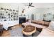 Bright living room featuring hardwood floors, a fireplace, and an eclectic selection of decor at 1649 Lauda Dr, Mount Pleasant, SC 29464