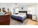 Spacious main bedroom featuring a large bed, hardwood floors, and ample natural light at 1649 Lauda Dr, Mount Pleasant, SC 29464