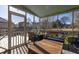 Relaxing screened patio with comfortable seating and views of the backyard at 1649 Lauda Dr, Mount Pleasant, SC 29464