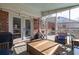 Covered patio with wood furniture and a view of the backyard and neighborhood at 1649 Lauda Dr, Mount Pleasant, SC 29464