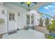 Charming outdoor space with covered patio, detailed trim and decor at 1702 Sparkleberry Ln, Johns Island, SC 29455