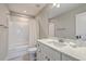Clean bathroom featuring a shower-tub combo, white vanity, and neutral tones at 1702 Sparkleberry Ln, Johns Island, SC 29455