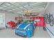Spacious garage with epoxy flooring and storage racks at 1702 Sparkleberry Ln, Johns Island, SC 29455