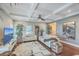 Bright and airy living room with tray ceilings, plush seating, and attractive decor at 1702 Sparkleberry Ln, Johns Island, SC 29455