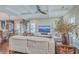 Open-concept living room showcases seamless flow into the dining area and abundant natural light at 1702 Sparkleberry Ln, Johns Island, SC 29455