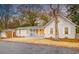 Charming home with covered front porch and well-maintained landscaping at 1706 W Avalon Cir, Charleston, SC 29407