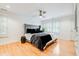Bright bedroom with hardwood floors, ceiling fan and natural light at 1886 Omni Blvd, Mount Pleasant, SC 29466