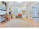 Home office with custom built-ins, hardwood floors, natural light, and private entrance for work at 1886 Omni Blvd, Mount Pleasant, SC 29466