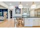 Open-concept kitchen with stainless steel appliances, a large island with seating, and hardwood floors at 1886 Omni Blvd, Mount Pleasant, SC 29466