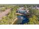 Scenic aerial view of the townhomes overlooking a pond with a fountain and lush greenery at 196 Fair Sailing Rd # 25, Mount Pleasant, SC 29466
