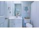 Clean bathroom featuring white vanity, toilet, mirror, and shower with curtain at 196 Fair Sailing Rd # 25, Mount Pleasant, SC 29466