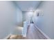 Upstairs hallway with hardwood floors and neutral color palette at 196 Fair Sailing Rd # 25, Mount Pleasant, SC 29466