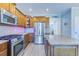 Modern kitchen with stainless steel appliances, granite countertops, and a spacious island at 196 Fair Sailing Rd # 25, Mount Pleasant, SC 29466