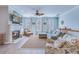Cozy living room with a fireplace, multiple windows, and comfortable seating at 196 Fair Sailing Rd # 25, Mount Pleasant, SC 29466