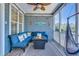 Relaxing screened porch with comfortable seating and outdoor decor at 196 Fair Sailing Rd # 25, Mount Pleasant, SC 29466