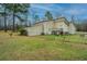Expansive backyard featuring a well-maintained lawn and convenient access from the house at 2015 Albert Storm Ave, Moncks Corner, SC 29461