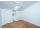 Bedroom featuring hardwood floors, skylight, and white closet doors offering ample storage in a room with white paneled ceiling at 2015 Albert Storm Ave, Moncks Corner, SC 29461