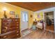 Cozy bedroom with hardwood floors, closet, and a door leading to the outside at 2015 Albert Storm Ave, Moncks Corner, SC 29461