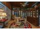 Cozy dining room featuring hardwood floors, wood-paneled ceiling, and french doors at 2015 Albert Storm Ave, Moncks Corner, SC 29461