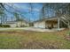 Detached two-car garage and carport providing ample space for parking and extra storage on a large lot at 2015 Albert Storm Ave, Moncks Corner, SC 29461