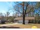 Spacious two-car garage and carport with ample parking space and storage on a well-maintained lot at 2015 Albert Storm Ave, Moncks Corner, SC 29461