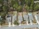 Overhead view of neighborhood homes with varied backyards; tree-lined streets at 2025 Lanneau Ln, Johns Island, SC 29455