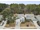 Charming homes nestled among mature trees, showcasing neighborhood charm and tranquility at 2025 Lanneau Ln, Johns Island, SC 29455