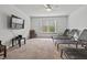 Bonus room featuring a ceiling fan, TV, and several lounge chairs to sit back and relax at 2025 Lanneau Ln, Johns Island, SC 29455