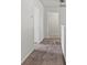 Hallway with soft carpet at 2025 Lanneau Ln, Johns Island, SC 29455