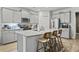 Modern kitchen featuring sleek gray cabinets, stainless steel appliances, and a granite-topped island at 2025 Lanneau Ln, Johns Island, SC 29455