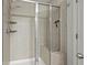 Shower stall has stone-look ceramic tiling with a built-in seat at 2025 Lanneau Ln, Johns Island, SC 29455