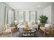 Well-lit living room featuring lots of natural light and comfortable seating at 207 Abercom Place Dr, Moncks Corner, SC 29461