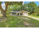 Charming single-story home featuring a well-maintained lawn and classic curb appeal at 208 Kentucky Dr, Ladson, SC 29456