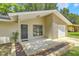 Inviting front porch with a landscaped flower bed, perfect for relaxing at 208 Kentucky Dr, Ladson, SC 29456