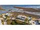 A stunning aerial view captures the grand estate with manicured grounds and waterfront access at 2123 Boatwright Rd, Johns Island, SC 29455